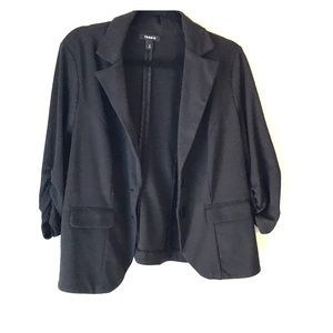 Black blazer with 3/4 length ruched sleeves.